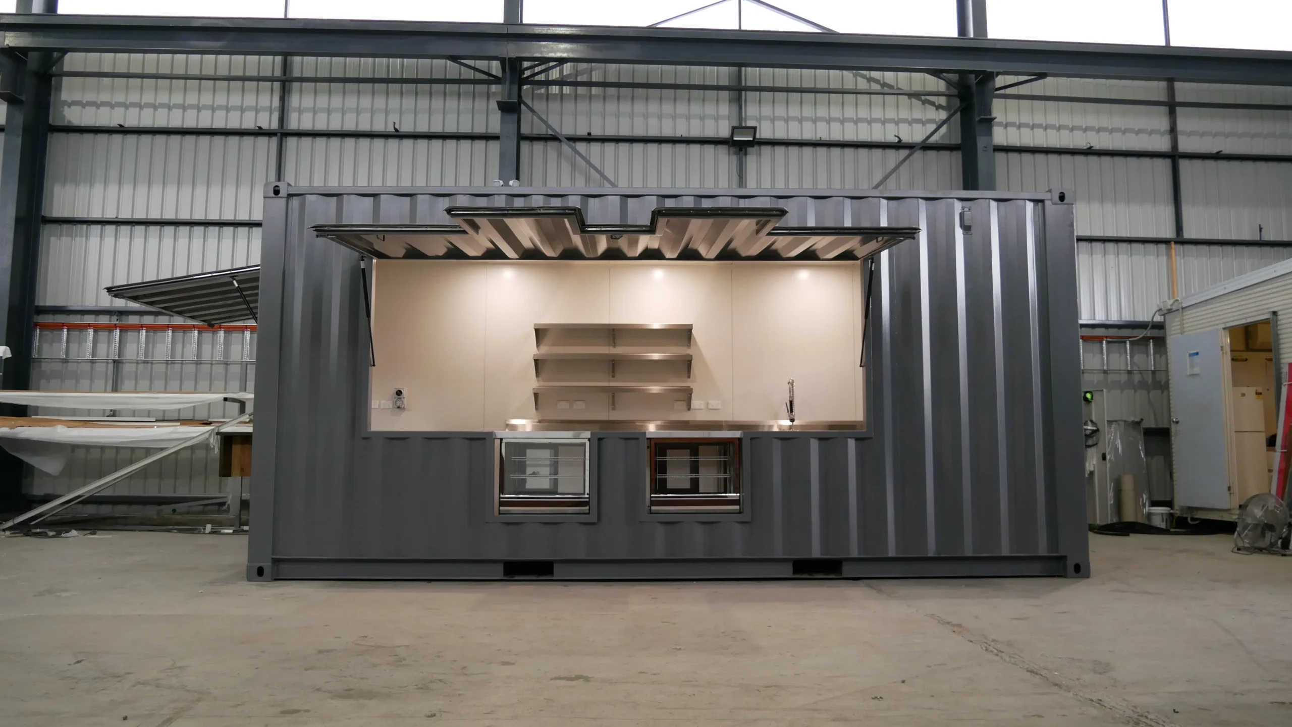Instagrammable Outdoor Cafe Design Using Modified Containers 11 Custom Cafe with Display Cabinets 4