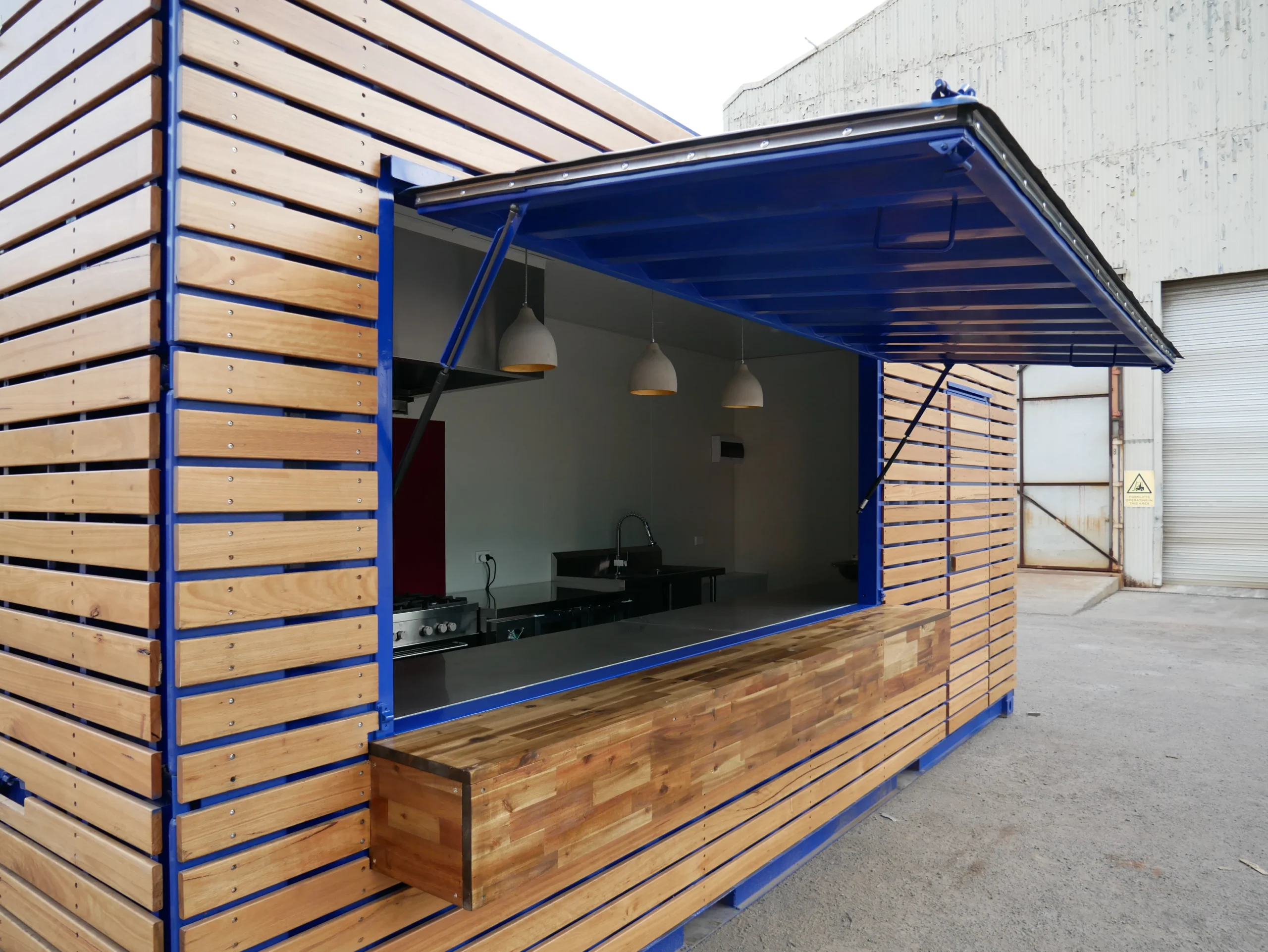 Instagrammable Outdoor Cafe Design Using Modified Containers 5 Desain Cafe Outdoor Instagramable pada Container Cafe with Timber Facade 3